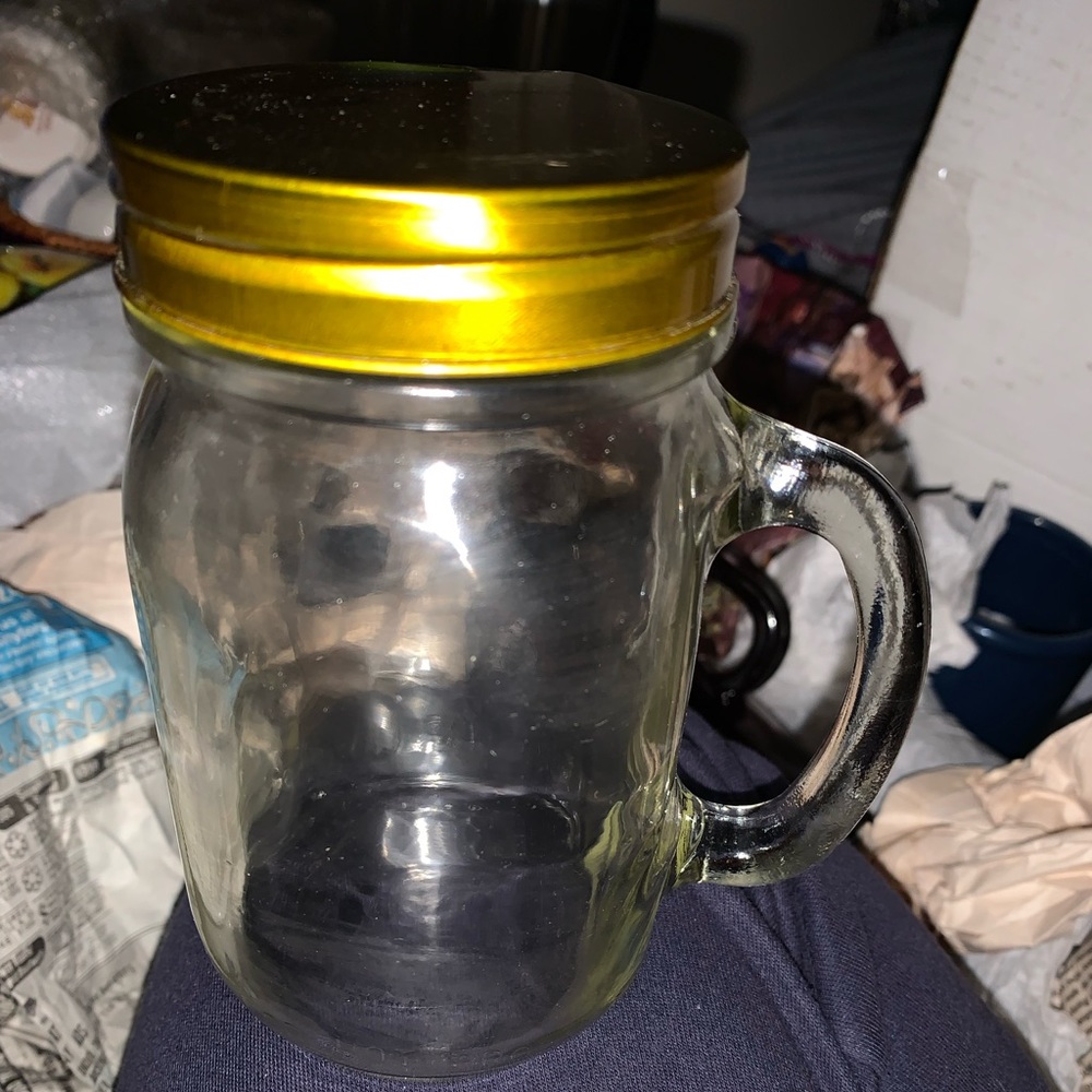 Canning Jar with lid and handle.